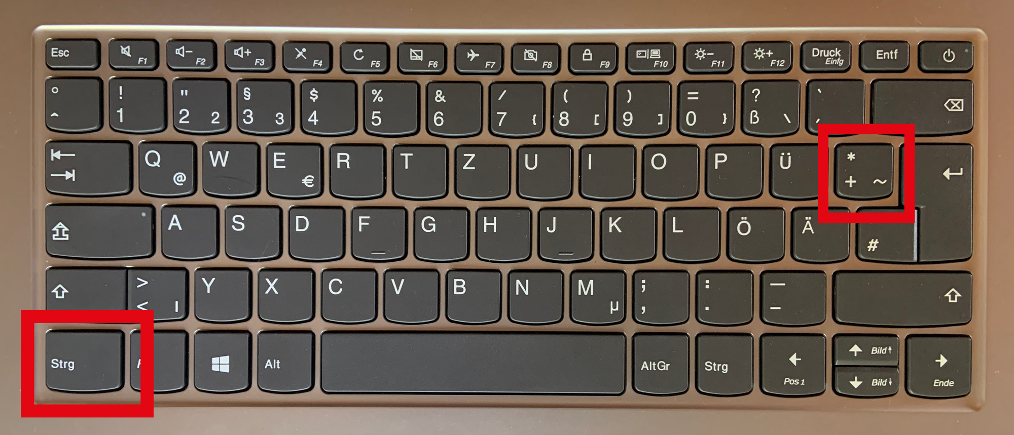 Bild Computertastatur auf der die Tasten Strg  und Plus markiert sind. 